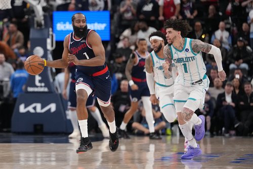 Jan 12, 2026; Inglewood, California, USA; LA Clippers guard James Harden (1) dribbles the ball against Charlotte Hornets guard LaMelo Ball (1) in the second half at Intuit Dome. Mandatory Credit: Kirby Lee-Imagn Images