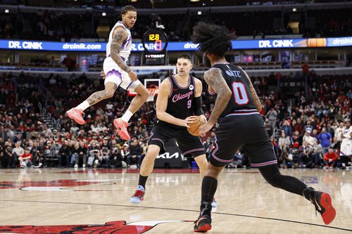 Jan 14, 2026; Chicago, Illinois, USA; Chicago Bulls center Nikola Vucevic (9) looks to pass the ball against the Utah Jazz during the second half at United Center. Mandatory Credit: Kamil Krzaczynski-Imagn Images