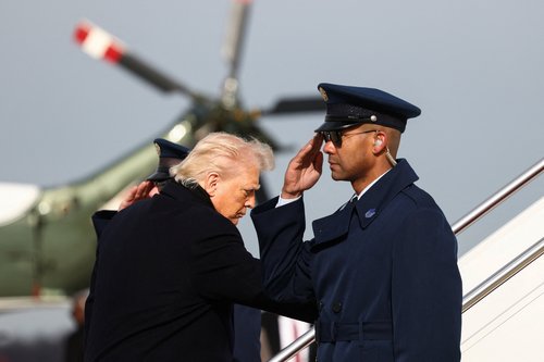 U.S. President Donald Trump boards Air Force One as he departs for Florida, at Joint Base Andrews, Maryland, U.S., January 16, 2026. REUTERS/Kevin Lamarque