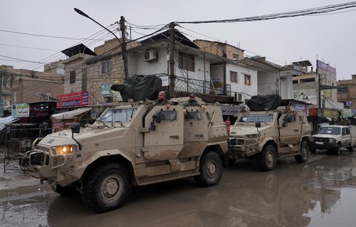 FILE PHOTO: Syrian army military vehicles are deployed inside the city of Tabqa, after the withdrawal of the Syrian Democratic Forces (SDF), in Tabqa, Syria, January 18, 2026. REUTERS/Karam al-Masri/File Photo