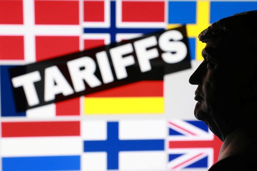 A 3D-printed miniature model of U.S. President Donald Trump and flags of eight European countries potentially facing U.S. tariffs after Trump said he may put a tariff on countries that do not support his plan for the United States to control Greenland