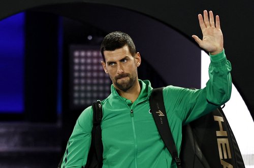 Tennis - Australian Open - Melbourne Park, Melbourne, Australia - January 19, 2026 Serbia's Novak Djokovic walks into the court before his first round match against Spain's Pedro Martinez REUTERS/Tingshu Wang