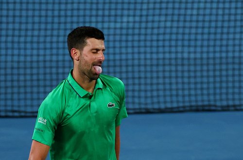 Tennis - Australian Open - Melbourne Park, Melbourne, Australia - January 19, 2026 Serbia's Novak Djokovic reacts during his first round match against Spain's Pedro Martinez REUTERS/Tingshu Wang