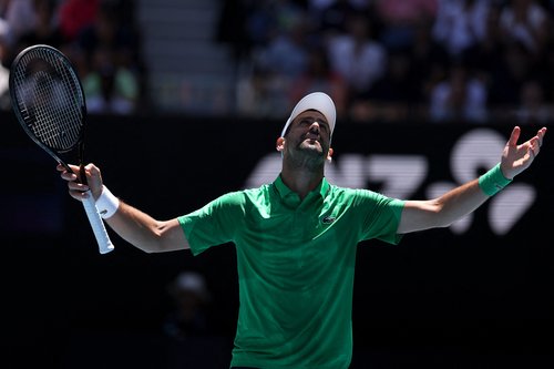 Tennis - Australian Open - Melbourne Park, Melbourne, Australia - January 22, 2026 Serbia's Novak Djokovic reacts during his second round match against Italy's Francesco Maestrelli REUTERS/Edgar Su