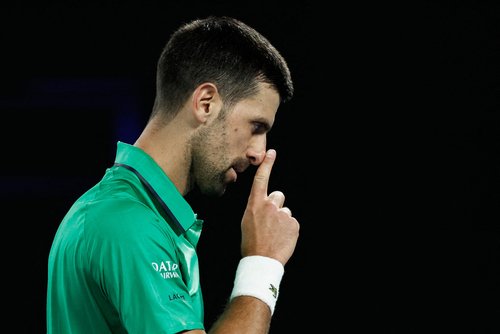 Tennis - Australian Open - Melbourne Park, Melbourne, Australia - January 24, 2026 Serbia's Novak Djokovic reacts during his third round match against Netherlands' Botic van de Zandschulp REUTERS/Tingshu Wang