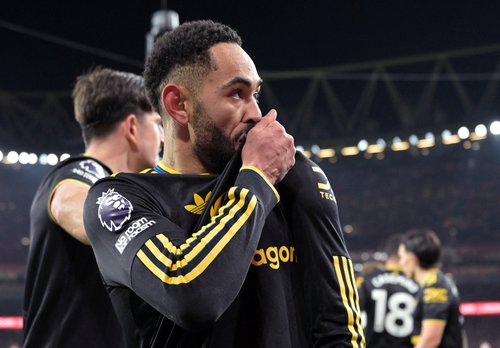 Soccer Football - Premier League - Arsenal v Manchester United - Emirates Stadium, London, Britain - January 25, 2026 Manchester United's Matheus Cunha celebrates scoring their third goal REUTERS/Dylan Martinez EDITORIAL USE ONLY. NO USE WITH UNAUTHORIZED