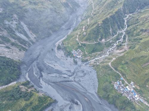 A drone view shows the areas affected by flooding of Budhi Gandaki River following a dry landslide in Chumnubri village, Gorkha district, Nepal
