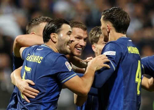 Soccer Football - Nations League - Group B4 - Bosnia and Herzegovina v Sweden - Bilino Polje Stadium, Zenica, Bosnia and Herzegovina - October 2, 2026 Bosnia and Herzegovina's Edin Dzeko celebrates scoring their first goal with teammates before his goal i