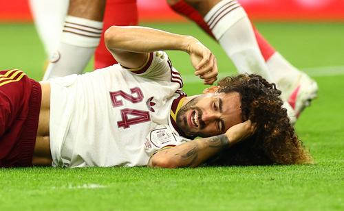 Soccer Football - FIFA World Cup 2026 - Semi Final - France v Spain - Dallas Stadium, Arlington, Texas, U.S. - July 14, 2026 Spain's Marc Cucurella reacts after sustaining an injury REUTERS/Hannah Mckay