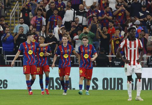 Soccer Football - Spanish Super Cup - Semi Final - FC Barcelona v Athletic Bilbao - King Abdullah Sports City, Jeddah, Saudi Arabia - January 7, 2026 FC Barcelona's Fermin Lopez celebrates scoring their second goal with Pau Cubarsi REUTERS/Vincent West