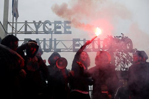 FILE PHOTO: French high school students block the access to the Lycee Paul Eluard high school