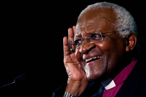 FILE PHOTO: Archbishop Desmond Tutu gestures at the launch of a human rights campaign marking the 60th anniversary of the signing of the Universal Declaration of Human Rights