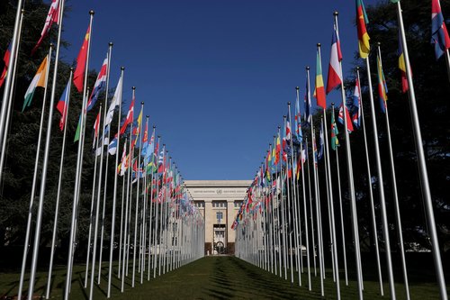 FILE PHOTO: The flags alley is seen outside the United Nations building during the Human Rights Council in Geneva