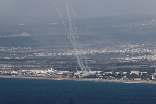 Israel's Iron Dome anti-missile system operates for interceptions as rockets are launched from Lebanon towards Israel, as seen from Haifa