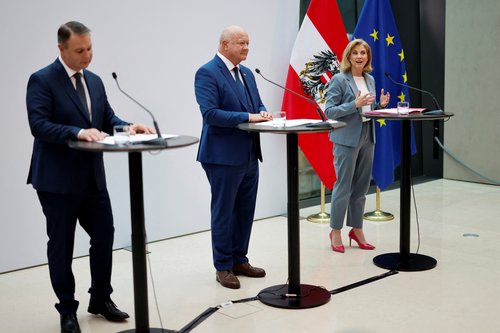 Austrian centrist parties give a press statement after finalizing coalition talks, in Vienna
