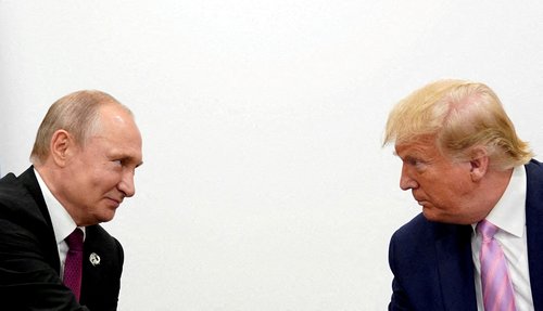 FILE PHOTO: U.S. President Donald Trump and Russian President Vladimir Putin at G20 leaders summit in Osaka