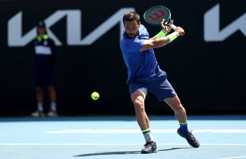 Tennis - Australian Open - Melbourne Park, Melbourne, Australia - January 21, 2026 Bosnia's Damir Dzumhur in action during his second round match against Argentina's Francisco Cerundolo REUTERS/Tingshu Wang