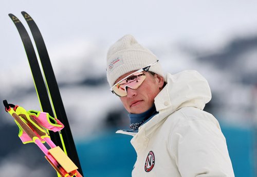 Milano Cortina 2026 Olympics - Cross-Country Skiing - Men's 50km Mass Start Classic - Tesero Cross-Country Skiing Stadium, Lago, Italy - February 21, 2026. Gold medallist Johannes Hoesflot Klaebo of Norway celebrates after the men's 50km mass start classi