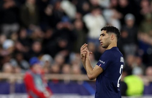 Soccer Football - UEFA Champions League - Play Off - First Leg - AS Monaco v Paris St Germain - Stade Louis II, Monaco - February 17, 2026 Paris St Germain's Achraf Hakimi celebrates scoring their second goal REUTERS/Alexandre Dimou
