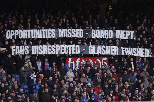 Soccer Football - Premier League - Crystal Palace v Wolverhampton Wanderers - Selhurst Park, London, Britain - February 22, 2026 Crystal Palace fans with a banner in protest to ownership and manager Oliver Glasner during the match Action Images via Reuter