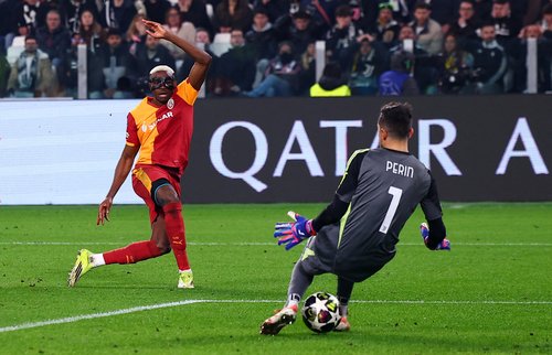 Soccer Football - UEFA Champions League - Play Off - Second Leg - Juventus v Galatasaray - Allianz Stadium, Turin, Italy - February 25, 2026 Galatasaray's Victor Osimhen scores their first goal past Juventus' Mattia Perin REUTERS/Guglielmo Mangiapane