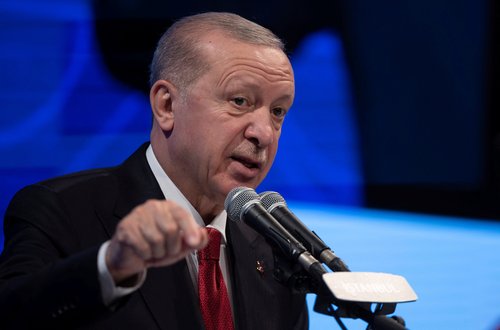 Turkish President Tayyip Erdogan delivers a speech during the