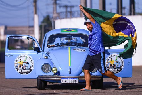 Brazilian Guilherme Martin poses with his 1971 Volkswagen Beetle in Porto Alegre, Brazil,