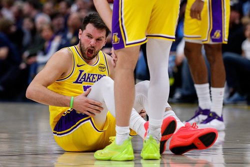 Mar 5, 2026; Denver, Colorado, USA; Los Angeles Lakers guard Luka Doncic (77) reacts after a play in the first quarter against the Denver Nuggets at Ball Arena. Mandatory Credit: Isaiah J. Downing-Imagn Images