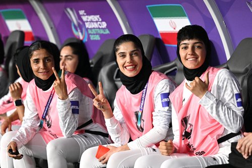 Iranian players gesture from the bench during the AFC Women’s Asian Cup Group A match between South Korea and Iran at Robina Stadium on the Gold Coast, Australia, March 2, 2026. AAP/via REUTERS ATTENTION EDITORS - THIS IMAGE WAS PROVIDED BY A THIRD PAR