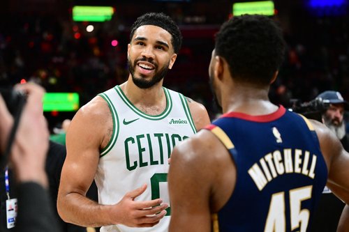 Mar 8, 2026; Cleveland, Ohio, USA; Cleveland Cavaliers guard Donovan Mitchell (45) talks to Boston Celtics forward Jayson Tatum (0) after the game at Rocket Arena. Mandatory Credit: Ken Blaze-Imagn Images