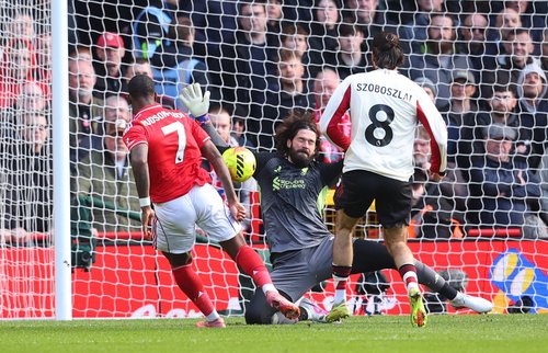 Soccer Football - Premier League - Nottingham Forest v Liverpool - The City Ground, Nottingham, Britain - February 22, 2026 Liverpool's Alisson Becker in action as he makes a save from Nottingham Forest's Callum Hudson-Odoi Action Images via Reuters/Ed Sy
