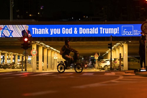 A screen displays a message in support of U.S. President Donald Trump