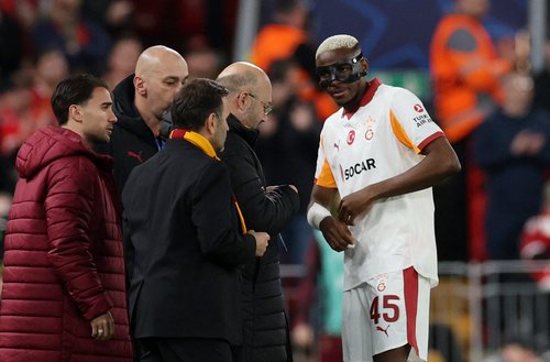 Soccer Football - UEFA Champions League - Round 16 - Second Leg - Liverpool v Galatasaray - Anfield, Liverpool, Britain - March 18, 2026 Galatasaray's Victor Osimhen receives medical attention after sustaining an injury REUTERS/Phil Noble