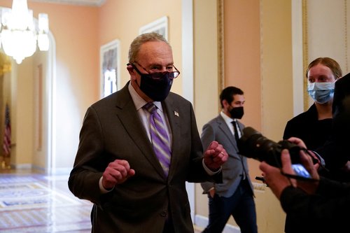 U.S. Senate Majority Leader Chuck Schumer (D-NY) walks to the Senate floor after a Democratic policy luncheon at the U.S. Capitol in Washington
