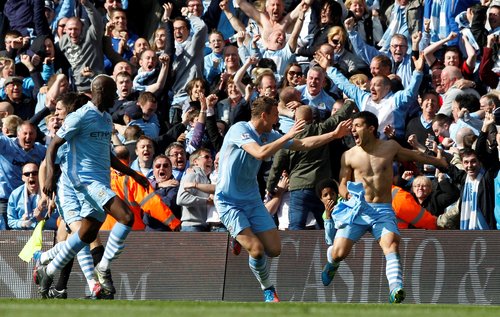 FILE PHOTO: Manchester City's Sergio Aguero celebrates his goal during their English Premier League soccer match against Queens Park Rangers in Manchester