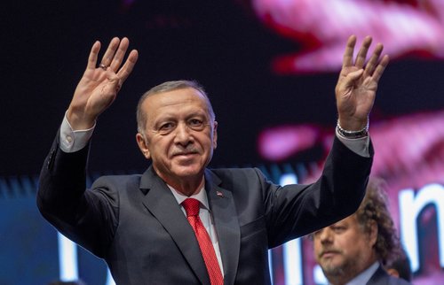 Turkish President Tayyip Erdogan greets the audience at Century of Turkey meeting in Ankara
