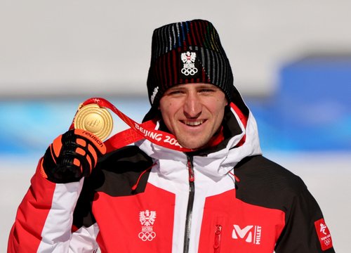 FILE PHOTO: Super-G gold medalist Matthias Mayer of Austria poses with his medal during victory ceremony at 2022 Beijing Olympics