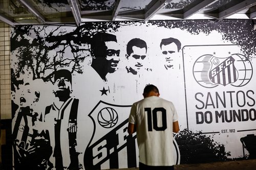 People mourn the death of Brazilian soccer legend Pele, in Santos