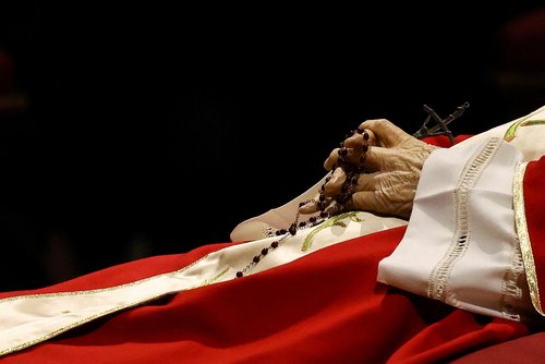Faithful pay homage to former Pope Benedict in St. Peter's Basilica at the Vatican