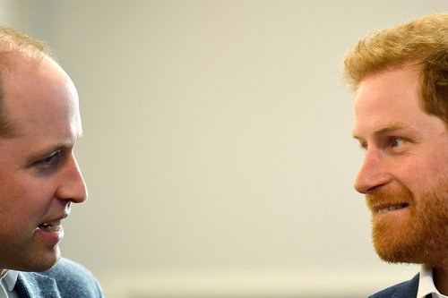 FILE PHOTO: Britain's Prince William and Prince Harry attend the opening of the Greenhouse Sports Centre in central London