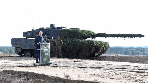 FILE PHOTO: German Chancellor Scholz visits German army training at a military base in Bergen