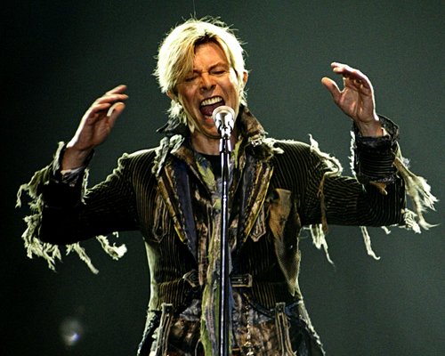 FILE PHOTO: DAVID BOWIE PERFORMS ON THE STAGE IN PRAGUE.