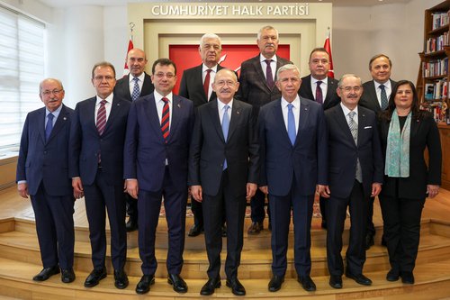 Turkey's main opposition CHP leader Kilicdaroglu poses with mayors from his party during a meeting in Ankara