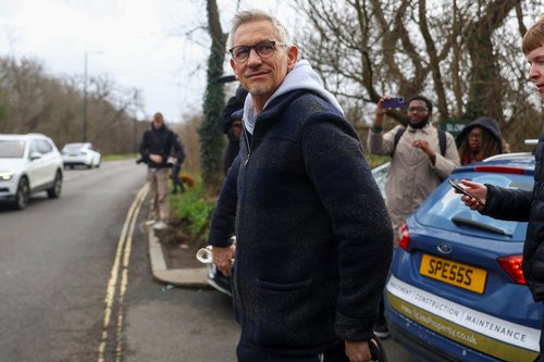Football presenter Gary Lineker walks outside his home in London