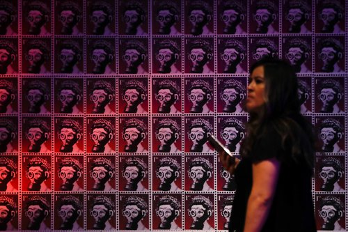 People visit the "Inside Banksy, unauthorized exhibition" in Mexico City