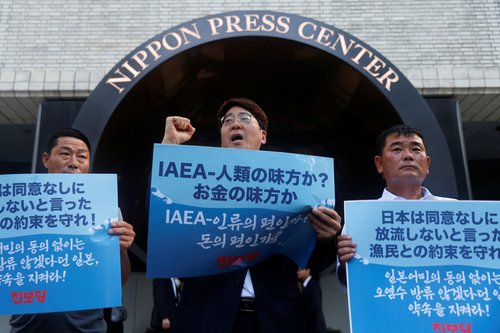 South Korean politician and fishermen protest, denouncing Japan's Fukushima water release before the news conference by IAEA chief Rafael Grossi in Tokyo