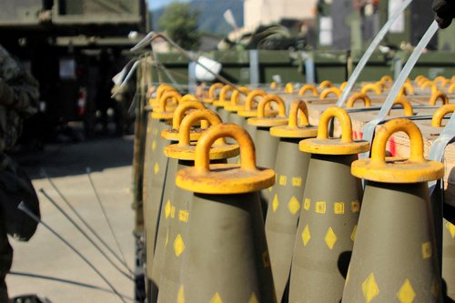 FILE PHOTO: 155mm Base Burn Dual Purpose Improved Conventional Munitions (DPICM) rounds wait to be loaded in South Korea