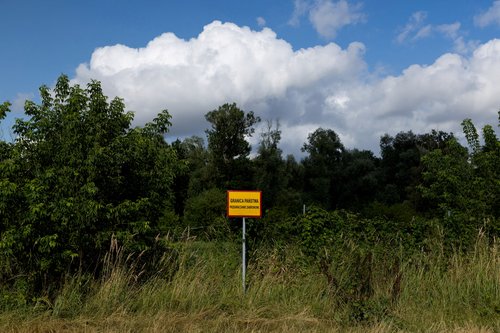 FILE PHOTO: A view across Bug River towards the Poland-Belarus border, near Kostomloty