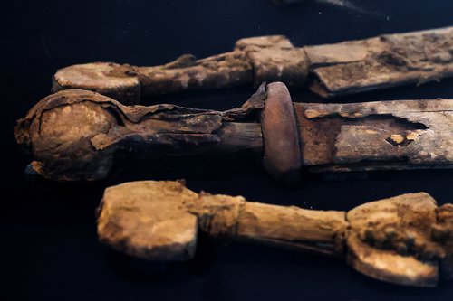 Ancient swords, believed by the Israel Antiquities Authority to be from the Roman era dating back 1,900 years and found in a weapons cache in a cave in an Israeli desert, are displayed in Jerusalem