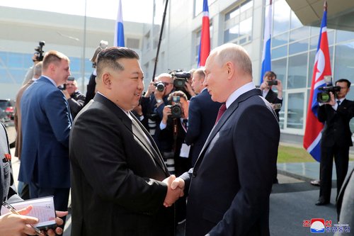 FILE PHOTO: North Korean leader Kim Jong Un meets Russia's President Vladimir Putin